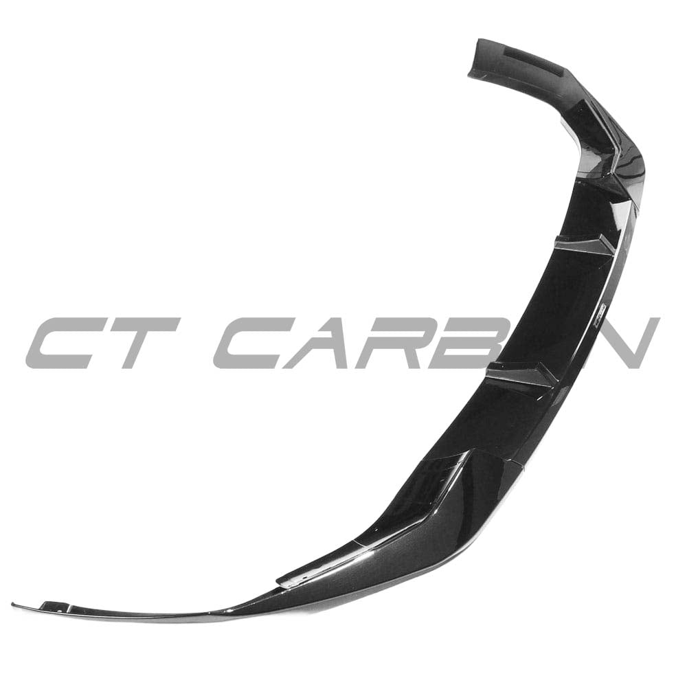 BMW 5 Series G30 LCI 2021+ CT Carbon V4 gloss black kit with M-style accents on a vehicle, showcasing sleek black trim details.