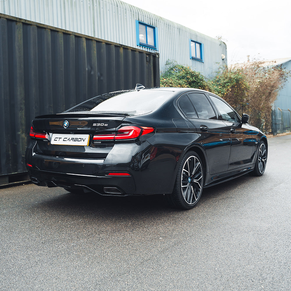 BMW 5 Series G30 LCI 2021+ V4 Gloss Black Kit by CT Carbon, featuring sleek black exterior accents and styling components.