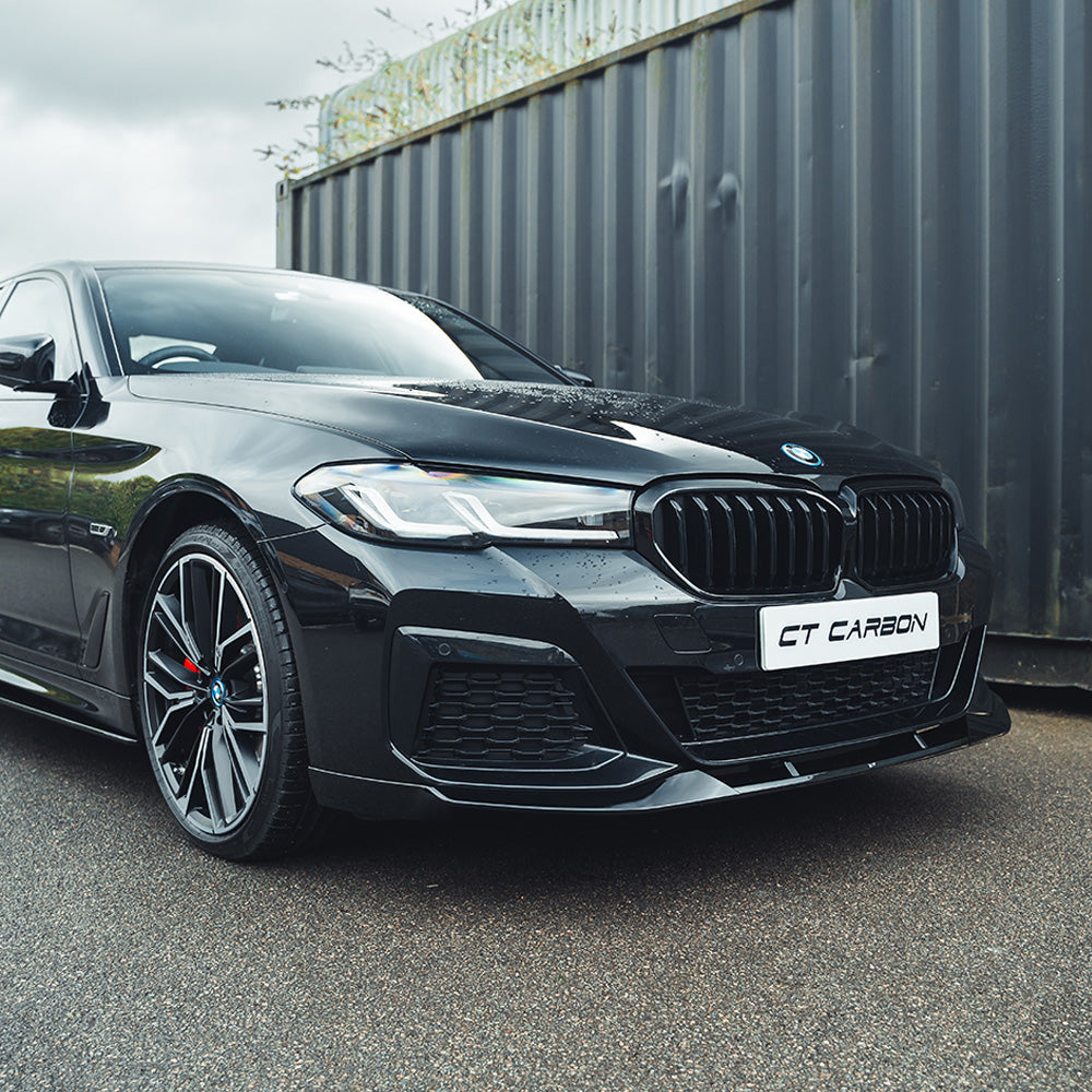 BMW 5 Series G30 LCI 2021+ CT Carbon V4 gloss black kit, including side trims and accents on the car's exterior.