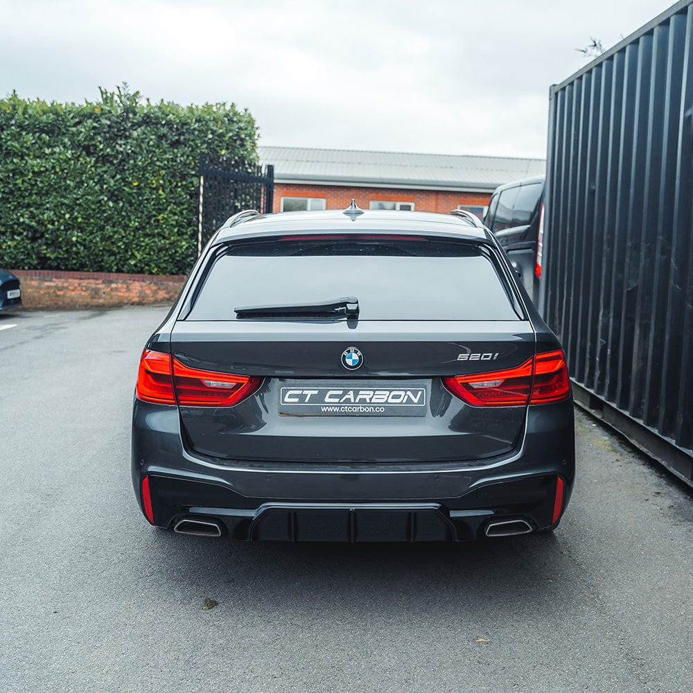 BMW 5 Series G30 G31 CT Carbon gloss black diffuser, pre-LCI V2, M-style design, shown on vehicle for sporty rear enhancement.
