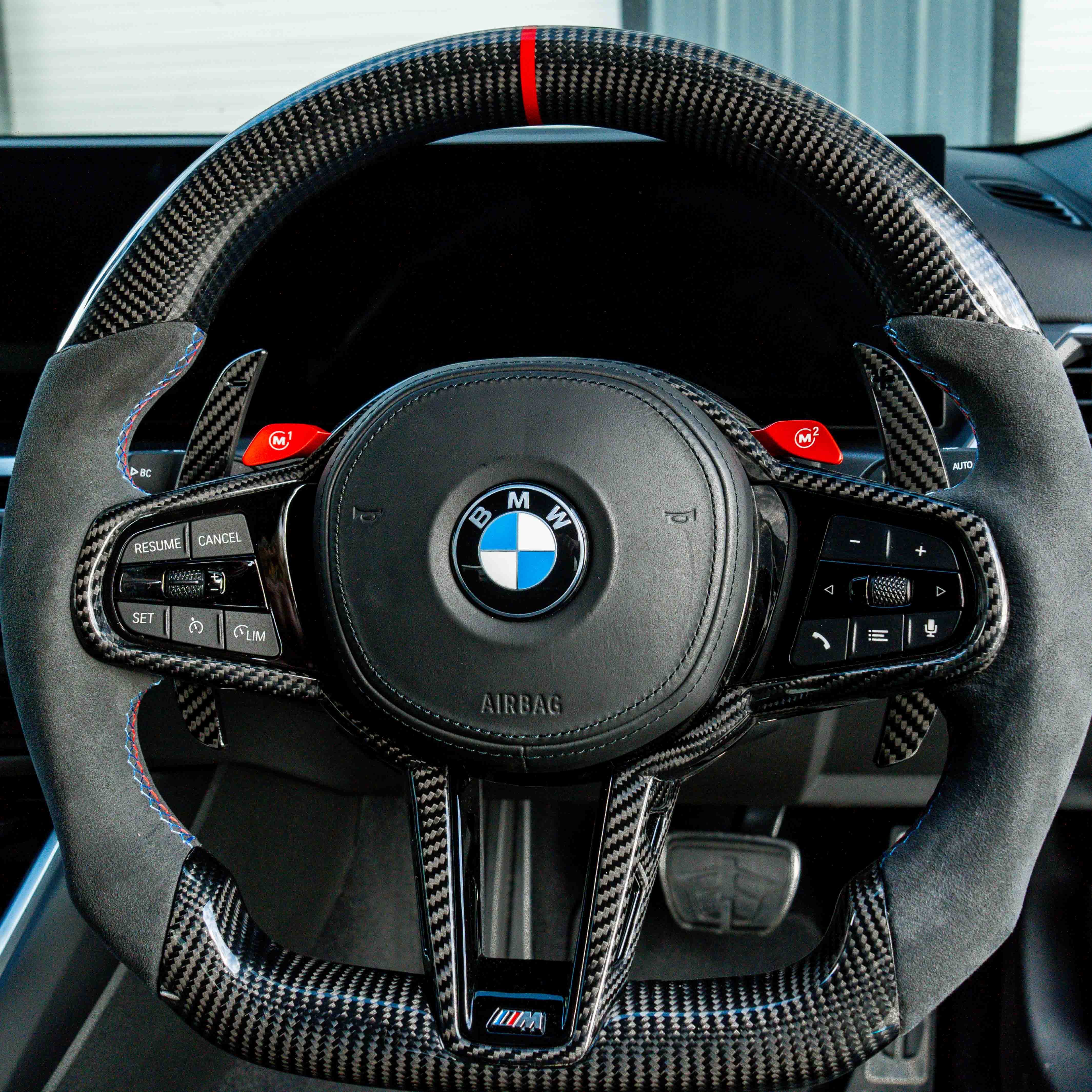 BMW carbon fiber magnetic shifter paddles by CT Carbon, sleek and lightweight automotive accessories for enhanced driving control.