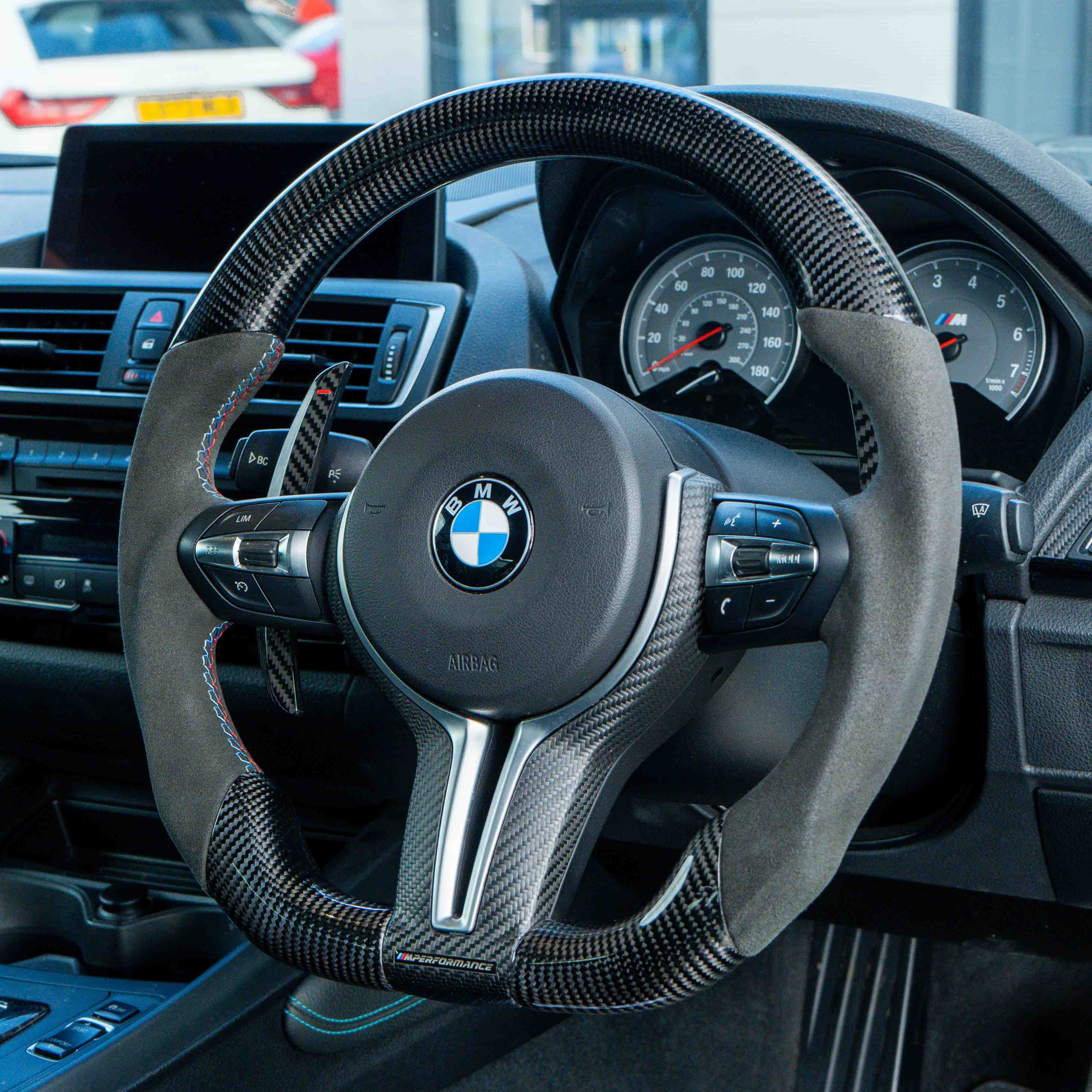 BMW carbon fiber magnetic shifter paddles by CT Carbon, featuring sleek design and lightweight carbon fiber finish.