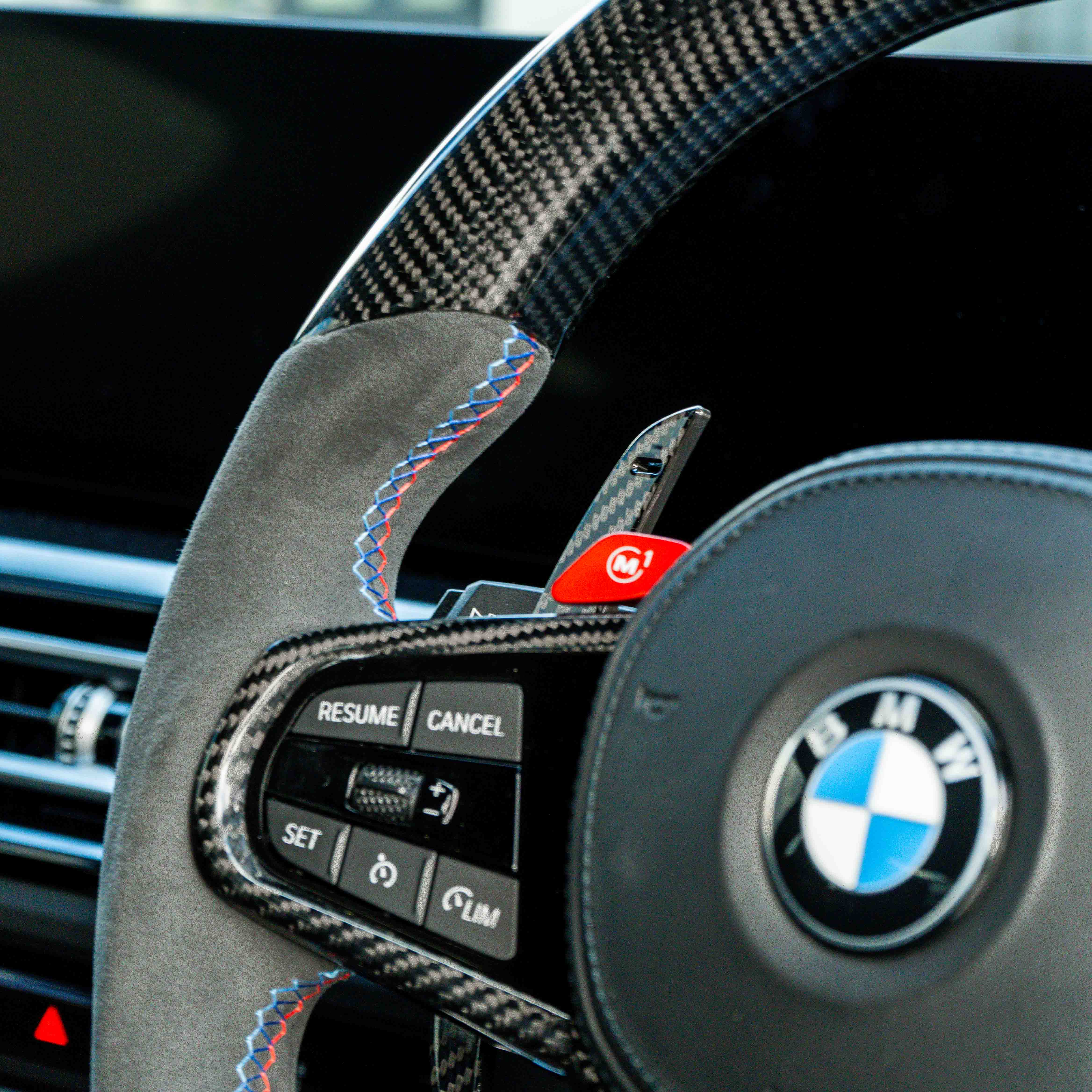 BMW carbon fiber magnetic shifter paddles by CT Carbon, sleek racing-style accessories for enhanced driving experience.