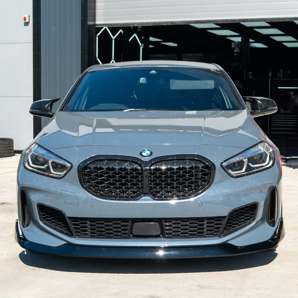BMW F40 1 Series Gloss Black Splitter by CT Carbon, V1, front bumper enhancement with sleek, high-gloss finish.