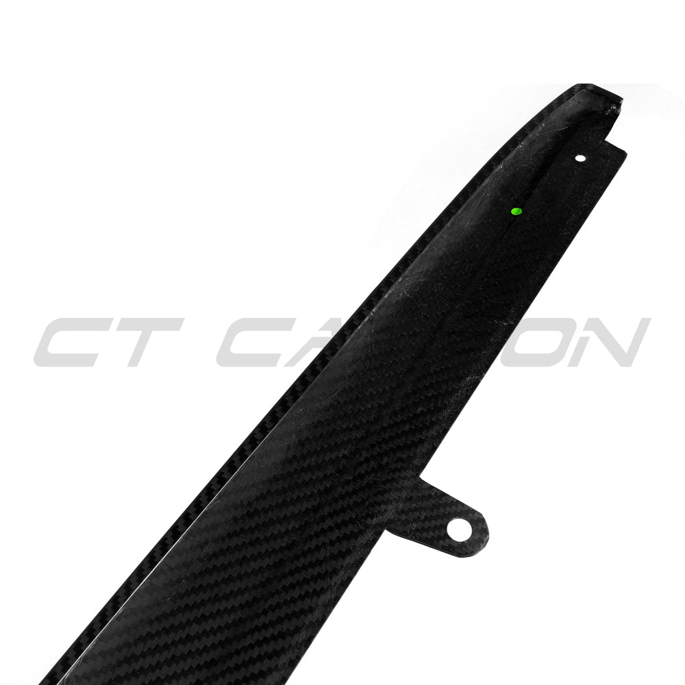 BMW F90 M5 and G30 G31 5 Series pre-preg carbon fiber side skirts by CT Carbon, shown installed on the vehicle's side profile.