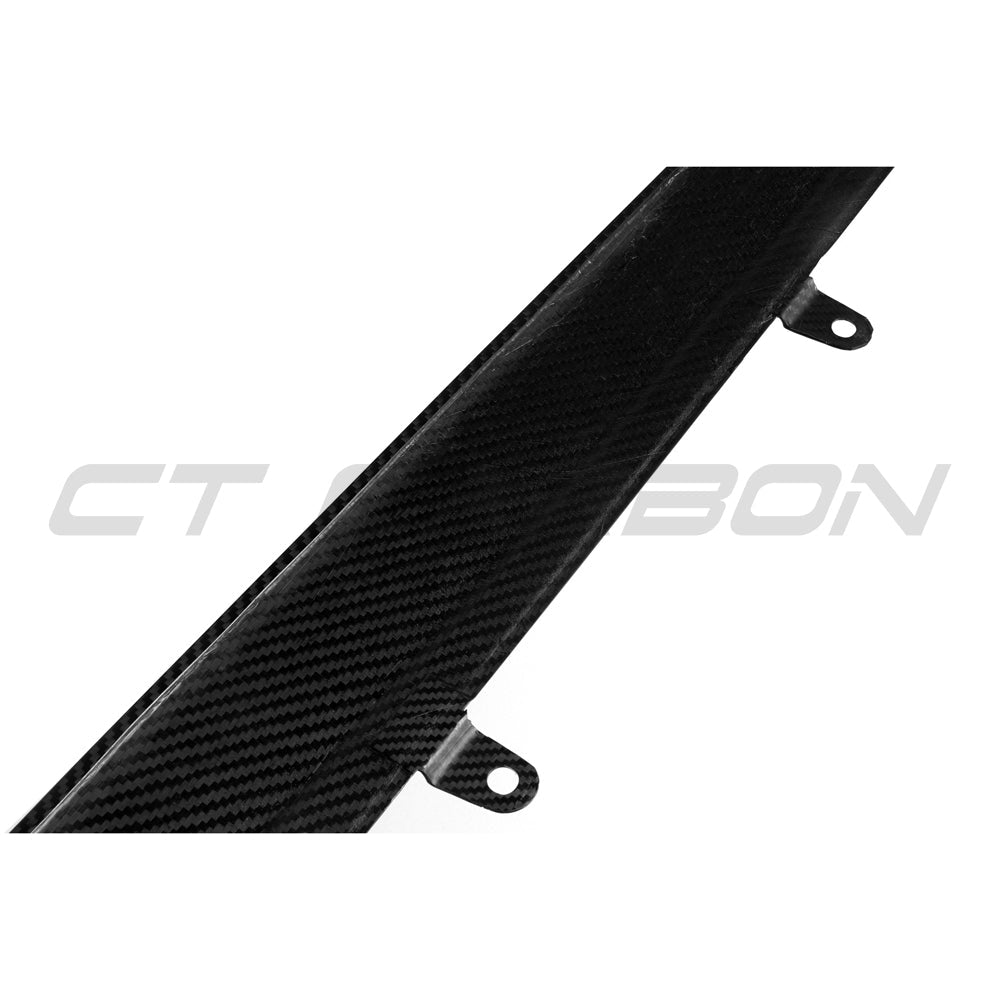 BMW F90 M5 and G30 G31 5 Series pre-preg carbon fiber side skirts by CT Carbon, shown installed on the vehicle.