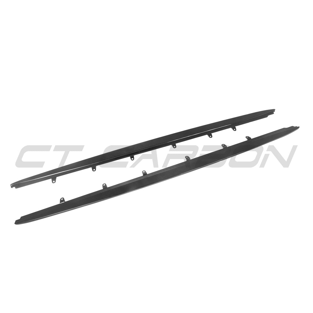 BMW F90 M5 and G30/G31 5 Series 2016-2024 CT Carbon pre-preg carbon fibre side skirts installed on the vehicle.