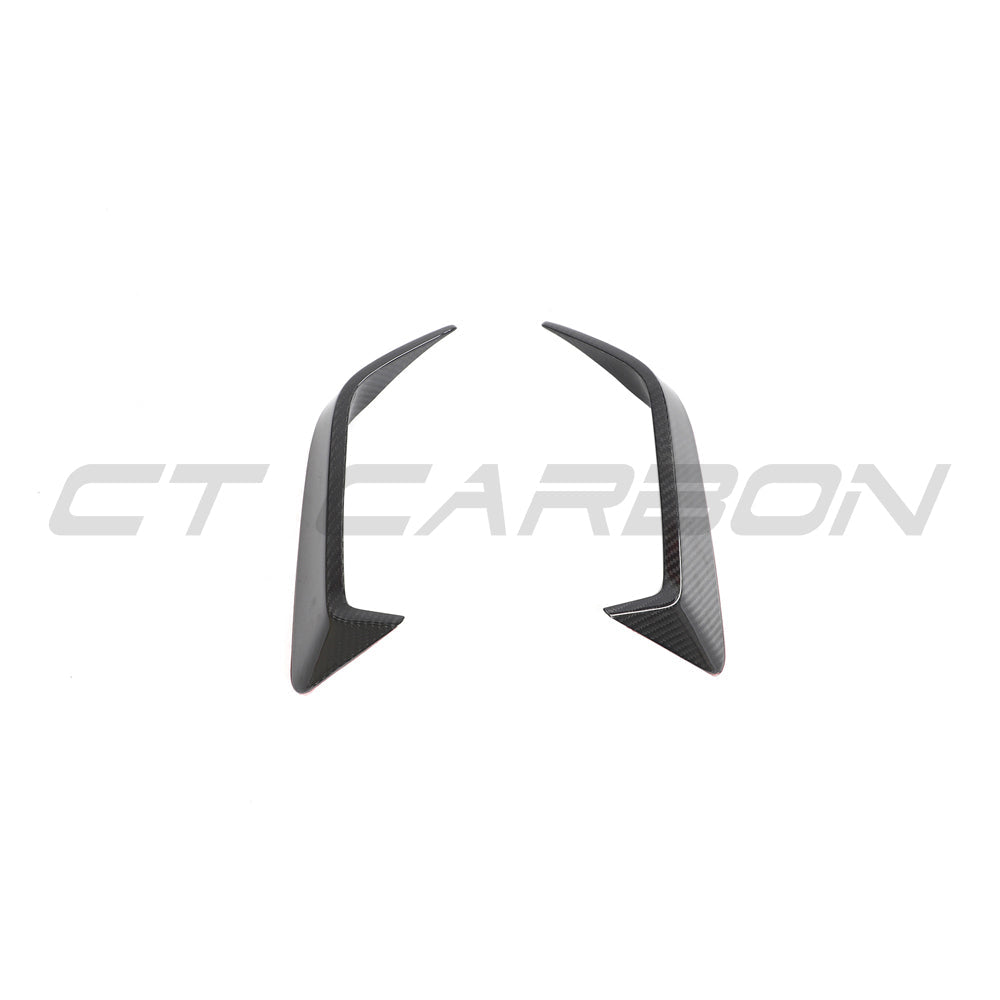 BMW F95 X5M 2023+ LCI carbon fibre rear bumper trim by CT Design, featuring sleek, textured carbon fibre finish on the bumper.