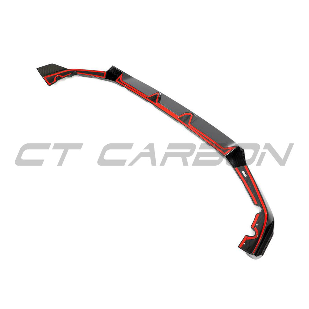 BMW F95 X5M 2023+ carbon fibre splitter by CT Design, showcasing the sleek, aerodynamic front splitter with detailed carbon fiber texture.