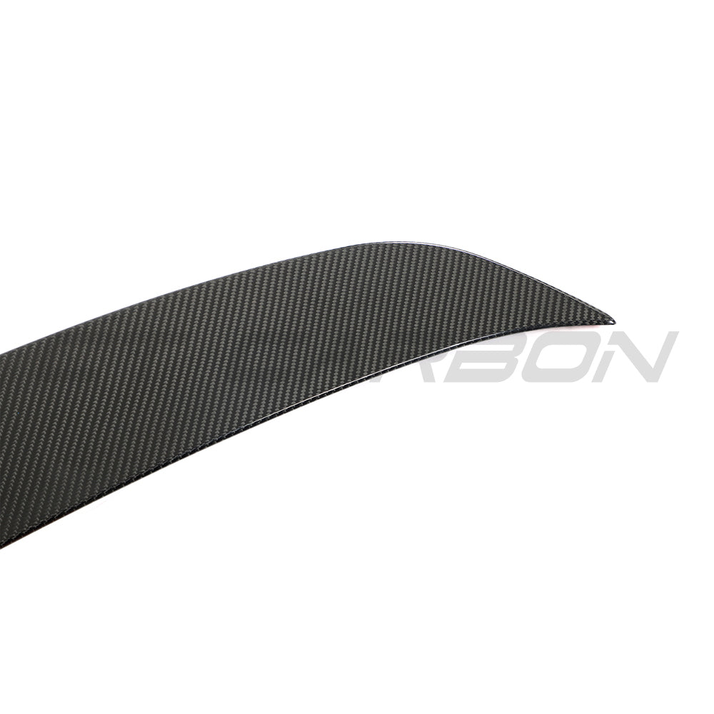 BMW F96 X6M and G06 X6 carbon fibre boot spoiler by CT Design, showcasing sleek aerodynamic design on the vehicle's rear.