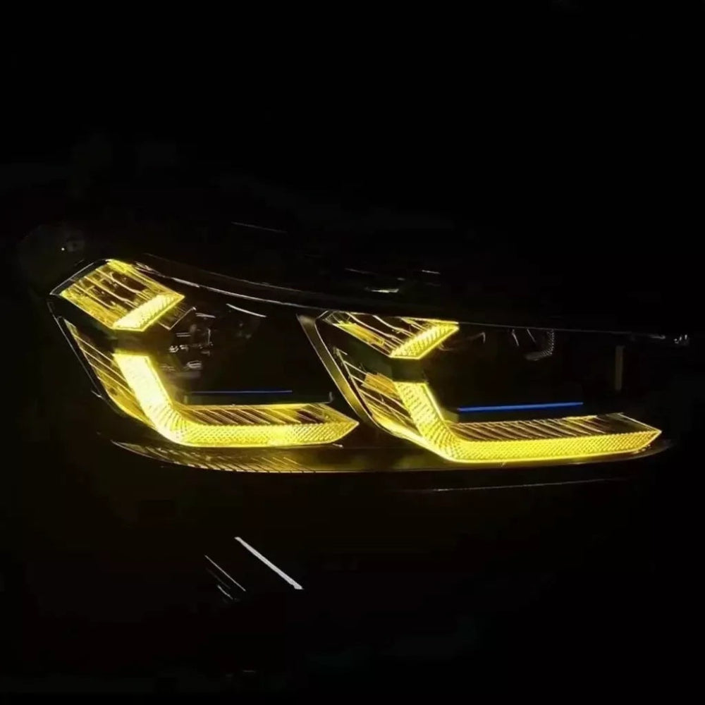 BMW G02 X4 LCI yellow adaptive DRL module set by CT Carbon, showing the LED daytime running lights on the vehicle.
