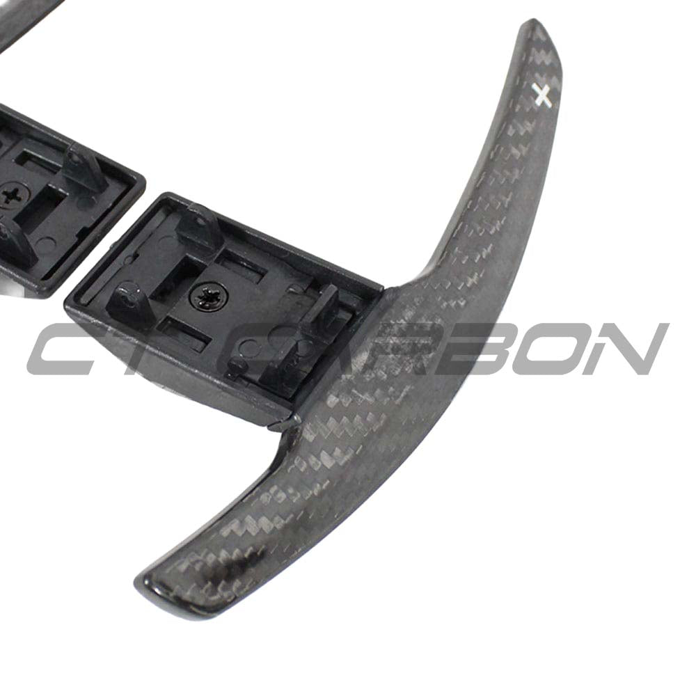 BMW Fxx carbon fibre shifter paddles V2 by CT Carbon, close-up showing sleek, lightweight racing-style paddle design