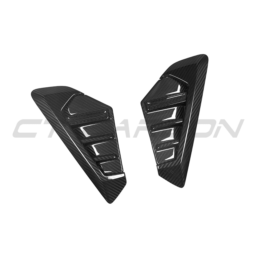 BMW G05 X5 2023+ LCI carbon fibre fender trim accessory by CT Carbon, showing close-up of sleek black textured finish on vehicle fenders.
