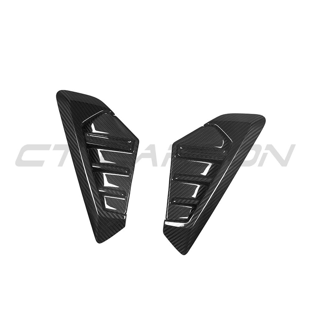 BMW G05 X5 2023+ LCI carbon fibre fender trim accessory by CT Carbon, showing close-up of sleek black textured finish.