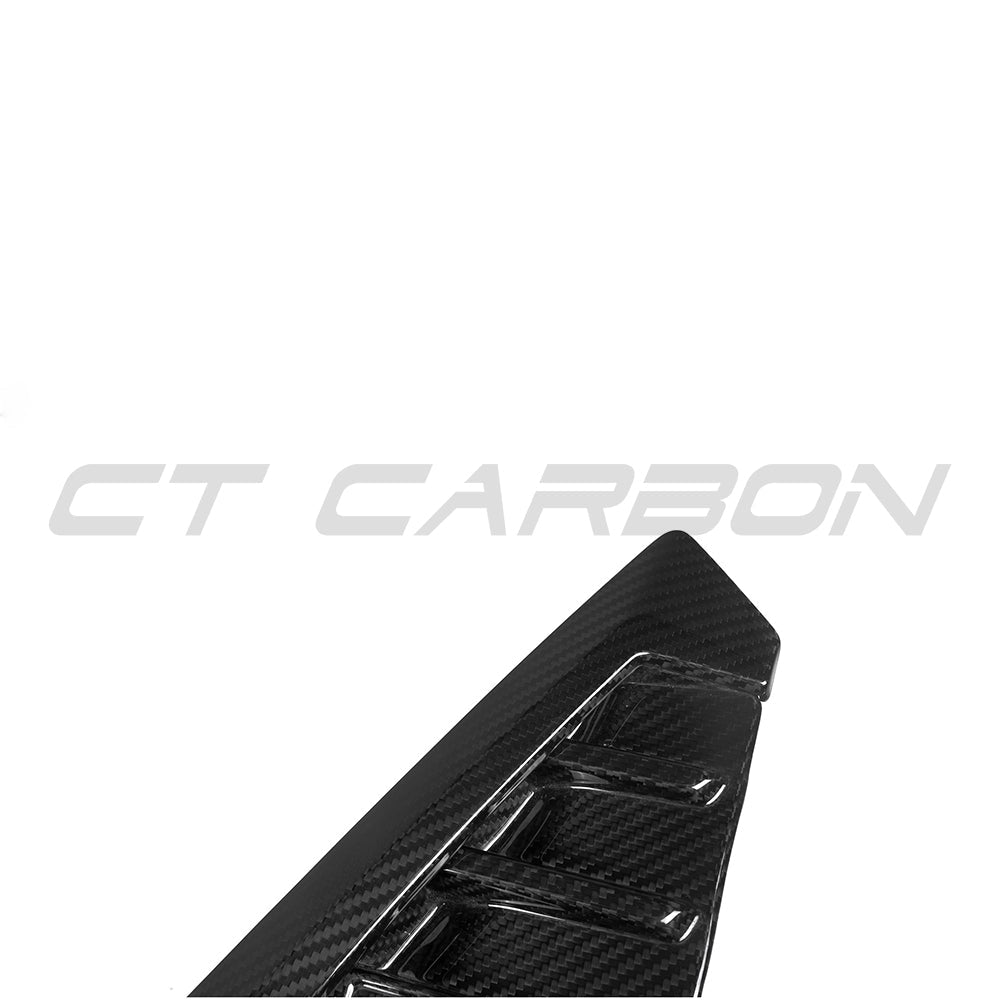BMW G05 X5 2023+ LCI carbon fiber fender trim by CT Carbon, sleek accessory enhancing vehicle's exterior style.