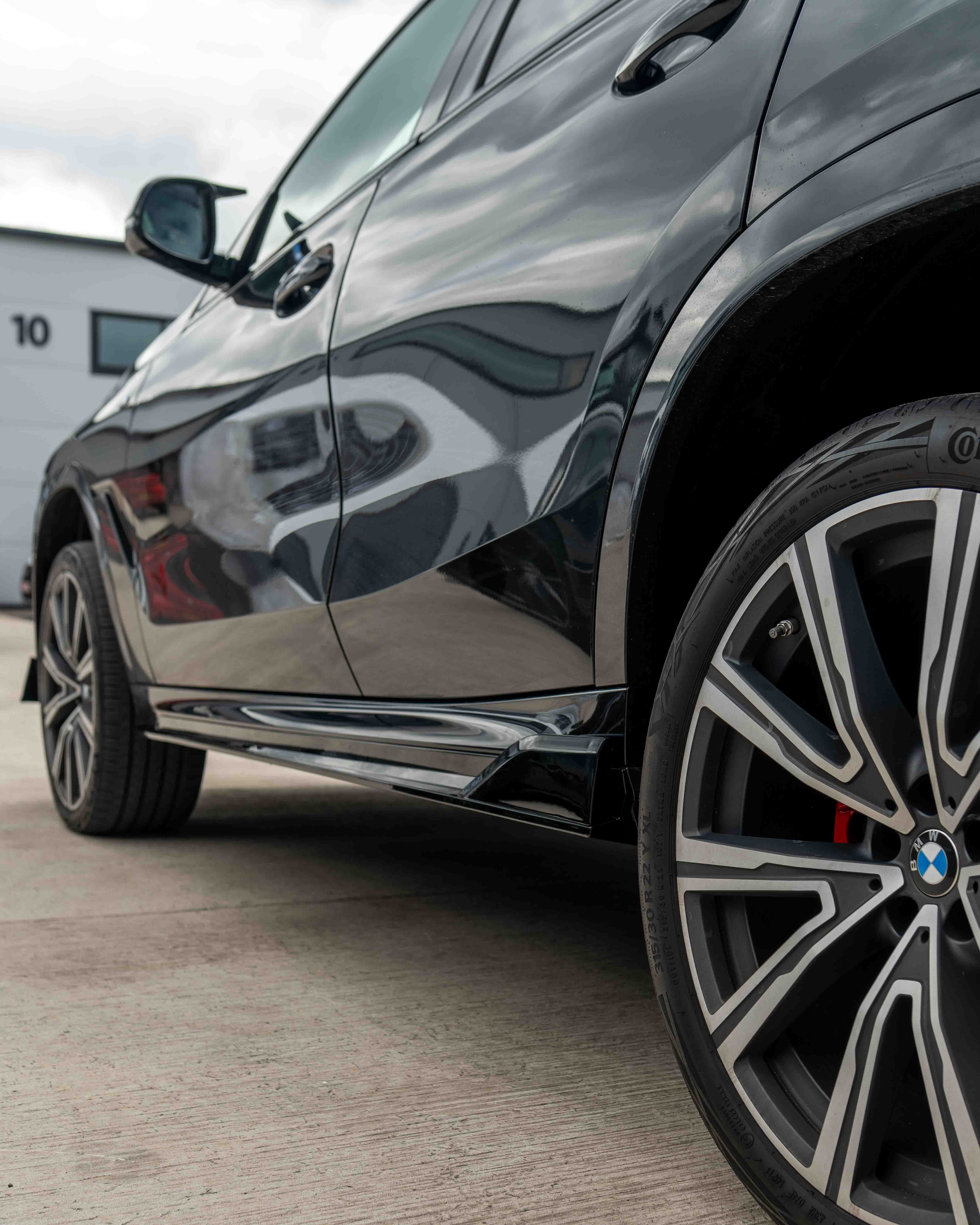 BMW G06 X6 Pre-LCI 2020-2024 full gloss black kit by CT Carbon, featuring a sleek, reflective black finish on the complete set.
