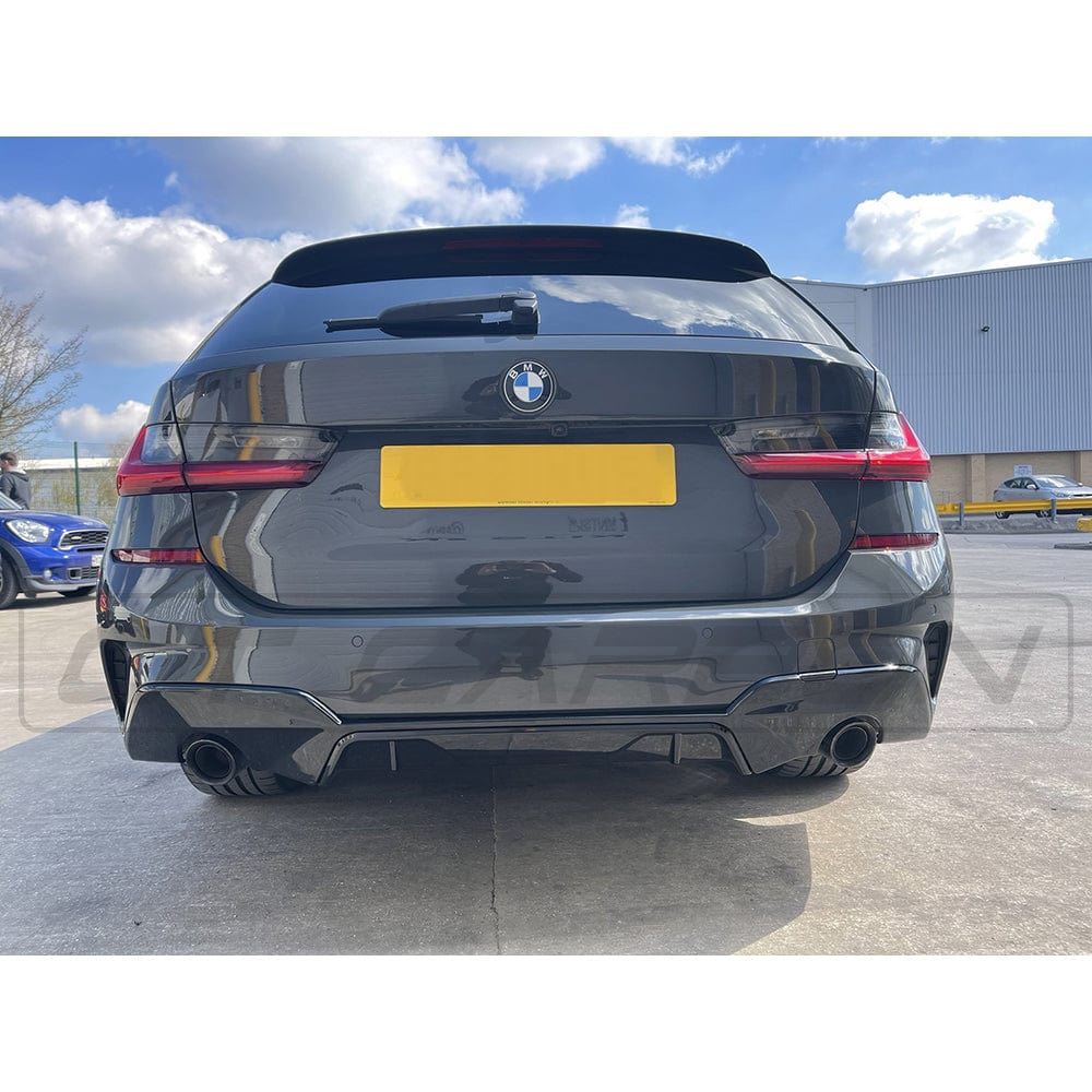 BMW G20 3 Series pre-LCI 2018-2022 gloss black exhaust tips kit by CT Carbon, featuring round tips and sleek finish.