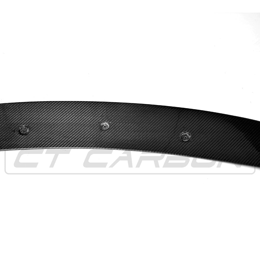 BMW G30/G31 5 Series 2016-2020 CT Carbon M Sport carbon fiber splitter installed on front bumper, showcasing sleek design and finish.