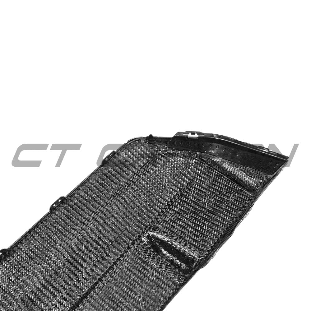BMW G42 2 Series carbon fiber diffuser by CT Carbon, V1 style, showcasing sleek aerodynamic design for enhanced vehicle performance.