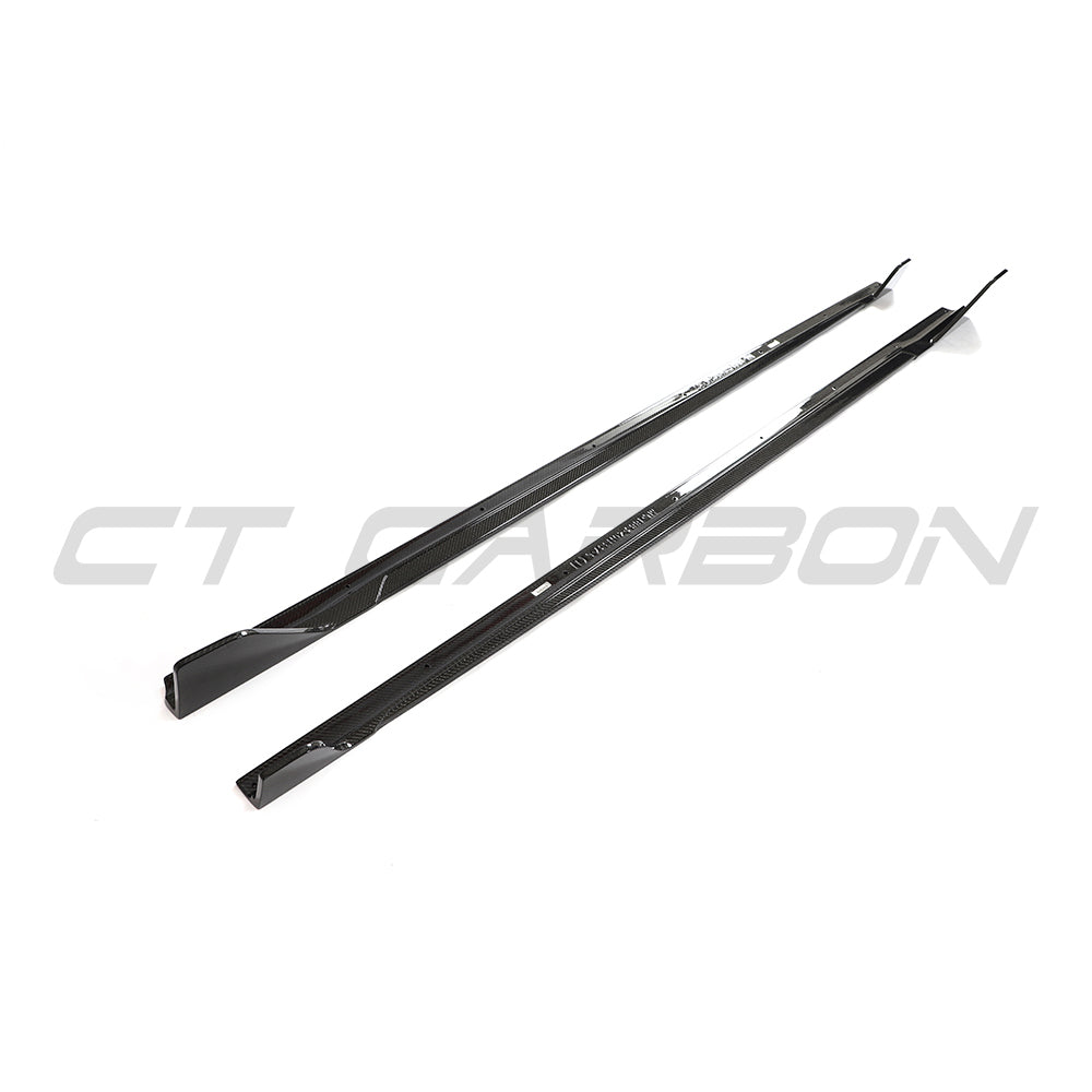 BMW G42 2 Series 2022+ CT Carbon full carbon fibre side skirts kit installed on the car, showcasing sleek, lightweight design.