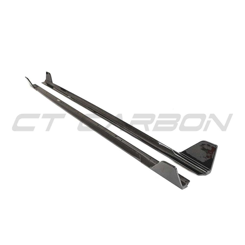 BMW G42 2 Series Carbon Fibre full-length side skirts by CT Carbon, showcasing sleek, lightweight side skirts on a sporty vehicle.