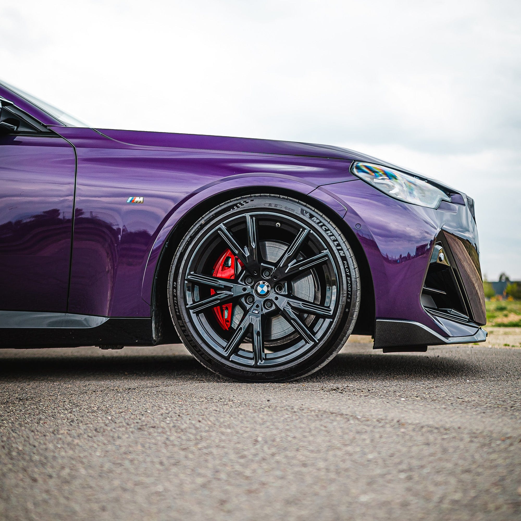 BMW G42 2 Series carbon fibre splitter by CT Carbon, V1, showcasing its sleek, lightweight aerodynamic design.