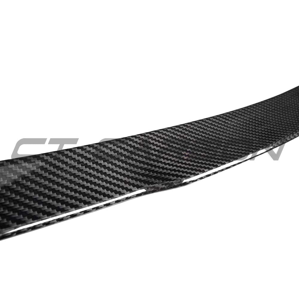 BMW G42 2 Series Carbon Fibre Spoiler by CT Carbon, V2 style, showcasing its sleek, aerodynamic design on the vehicle.