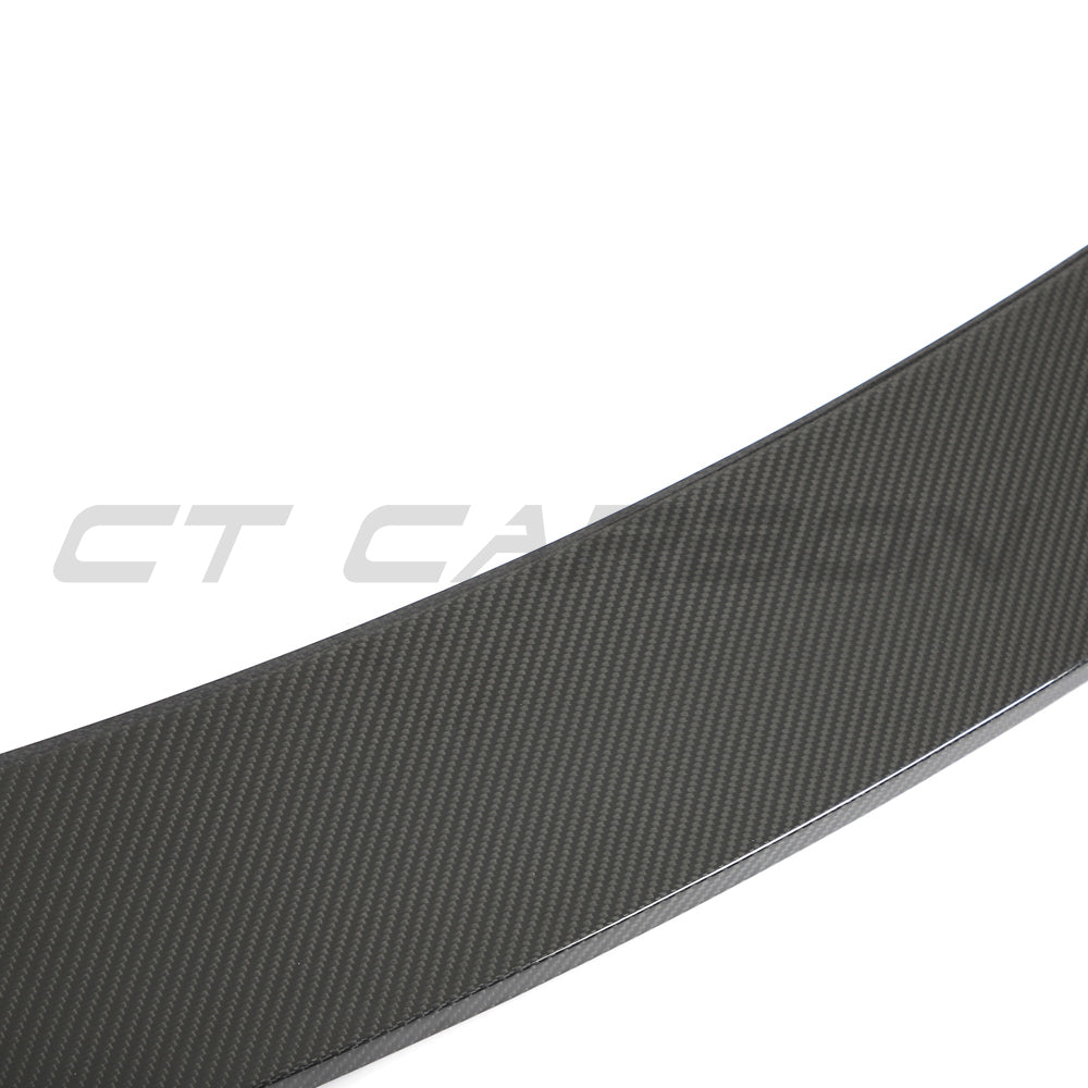 BMW G80 M3 and G20 3 Series carbon fiber spoiler by CT Carbon, showing sleek aerodynamic design on the vehicle.