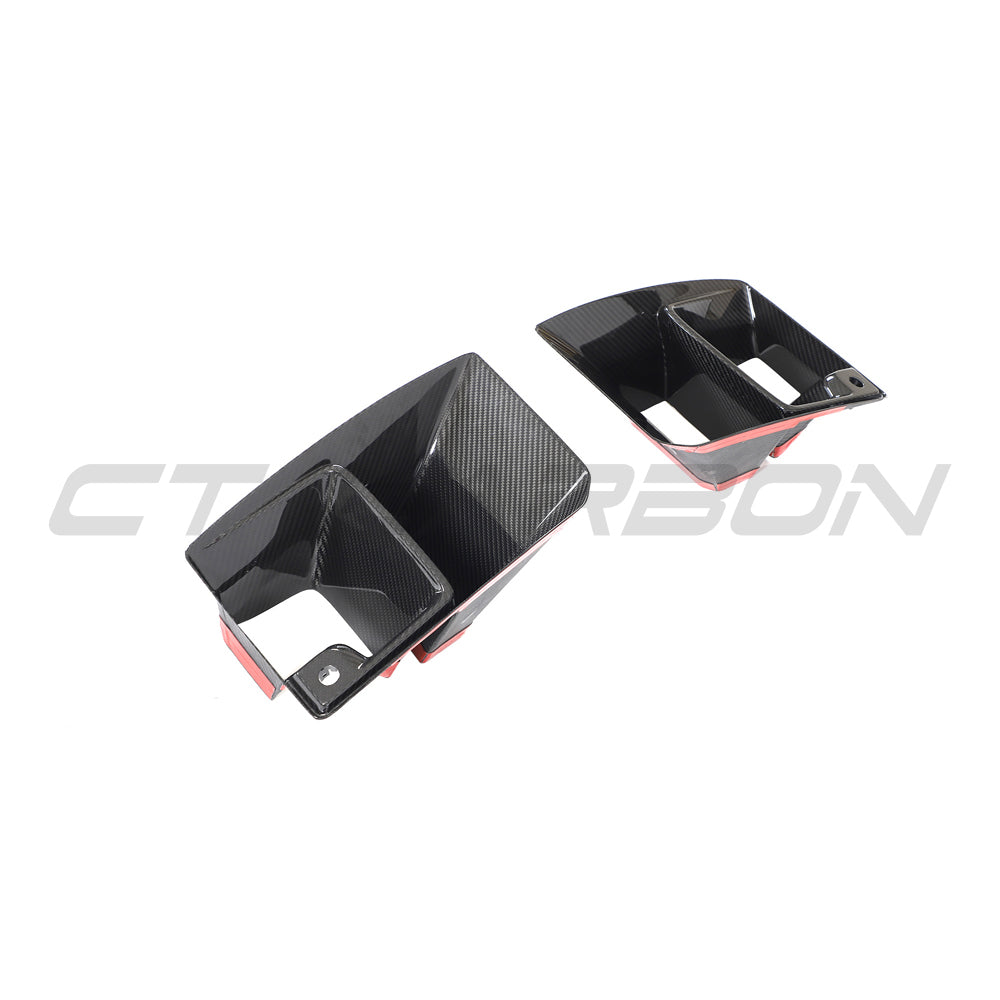 BMW G87 M2 carbon fiber ducts by CT Design, showcasing sleek lightweight accessories with detailed carbon fiber weave.