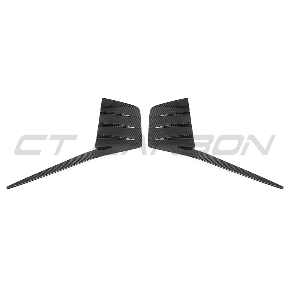 BMW G87 M2 carbon fiber rear bumper trim accessory by CT Carbon, showing sleek black finish and precise fit on the vehicle.