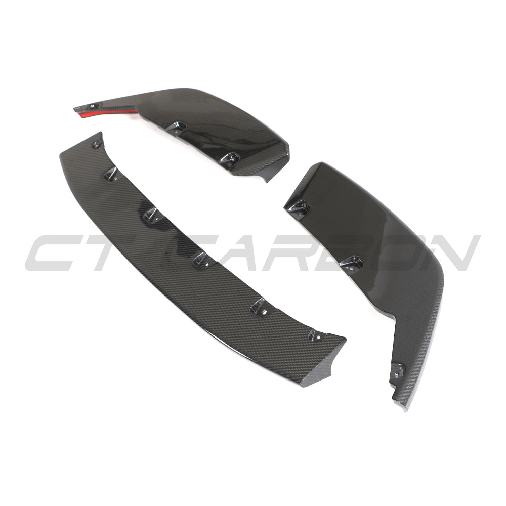 BMW G87 M2 full carbon fibre front end kit by CT Design, featuring splitter components on a sleek, high-performance vehicle.