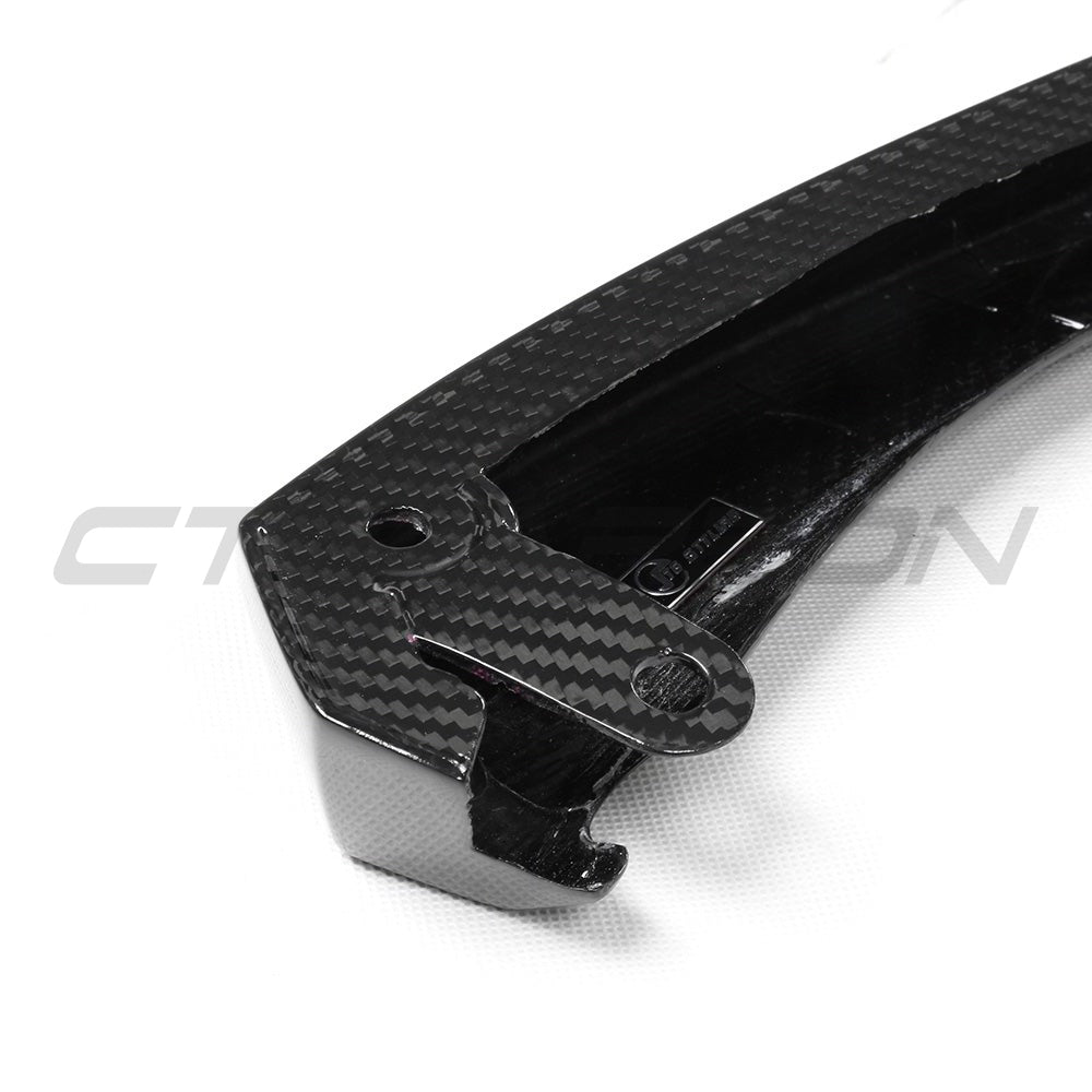 BMW G87 M2 carbon fibre splitter by CT Carbon, V3 version, mounted on the front of the sports car, showcasing lightweight aerodynamic design.