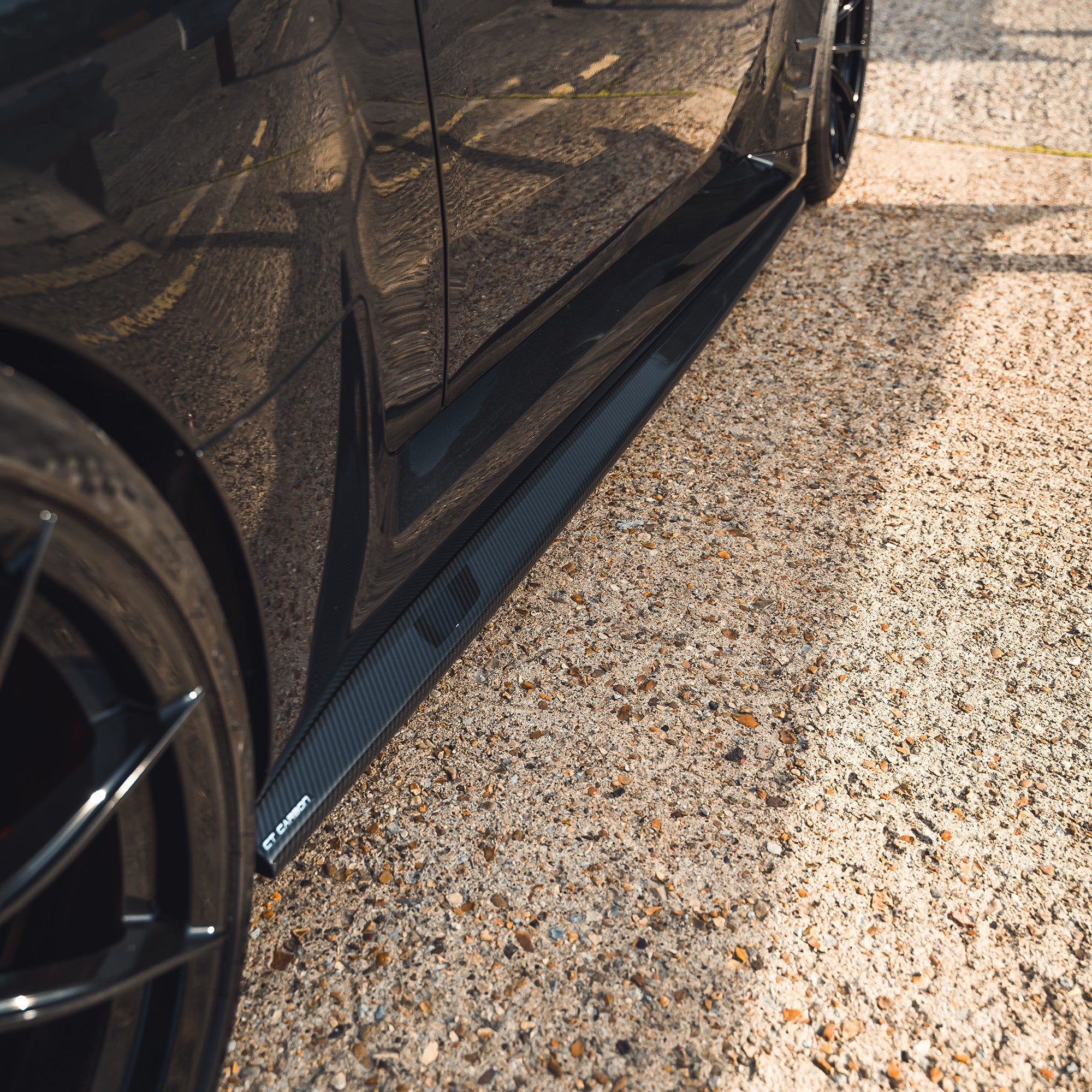 BMW G87 M2 full carbon fiber kit by CT Design, featuring lightweight, high-quality carbon fiber components for sporty performance.