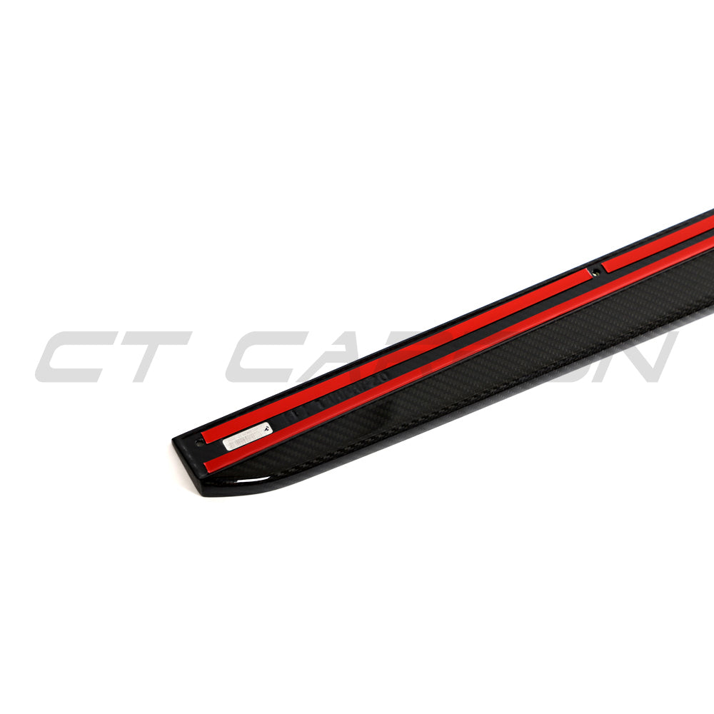 BMW G87 M2 full carbon fiber kit by CT Carbon, featuring lightweight, glossy carbon fiber panels on the car's exterior.