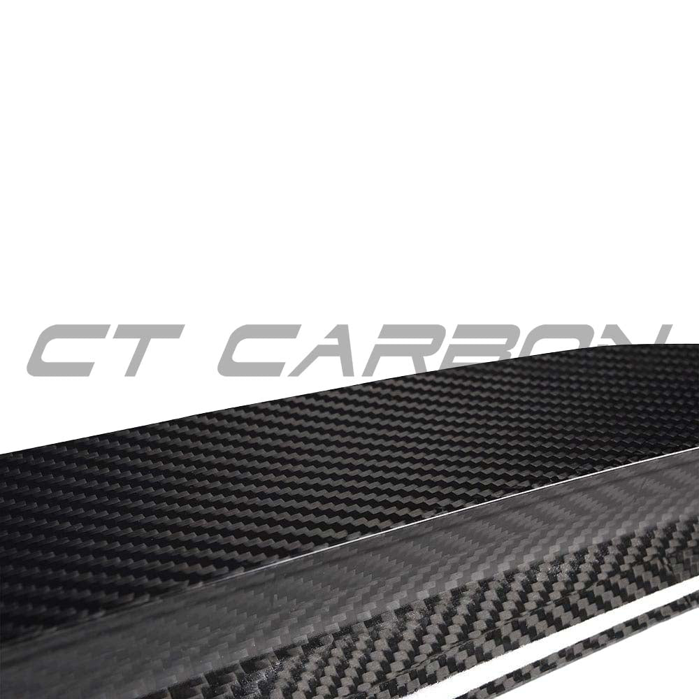 BMW G87 M2 and G42 2 Series Carbon Fibre Spoiler by CT Carbon, stylish V1 design, shown on a sleek sports car.