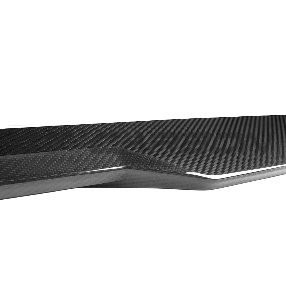 BMW G87 M2/G42 2 Series CT Carbon fiber spoiler, V1 style, with aerodynamic design and carbon fiber finish on the car's rear.