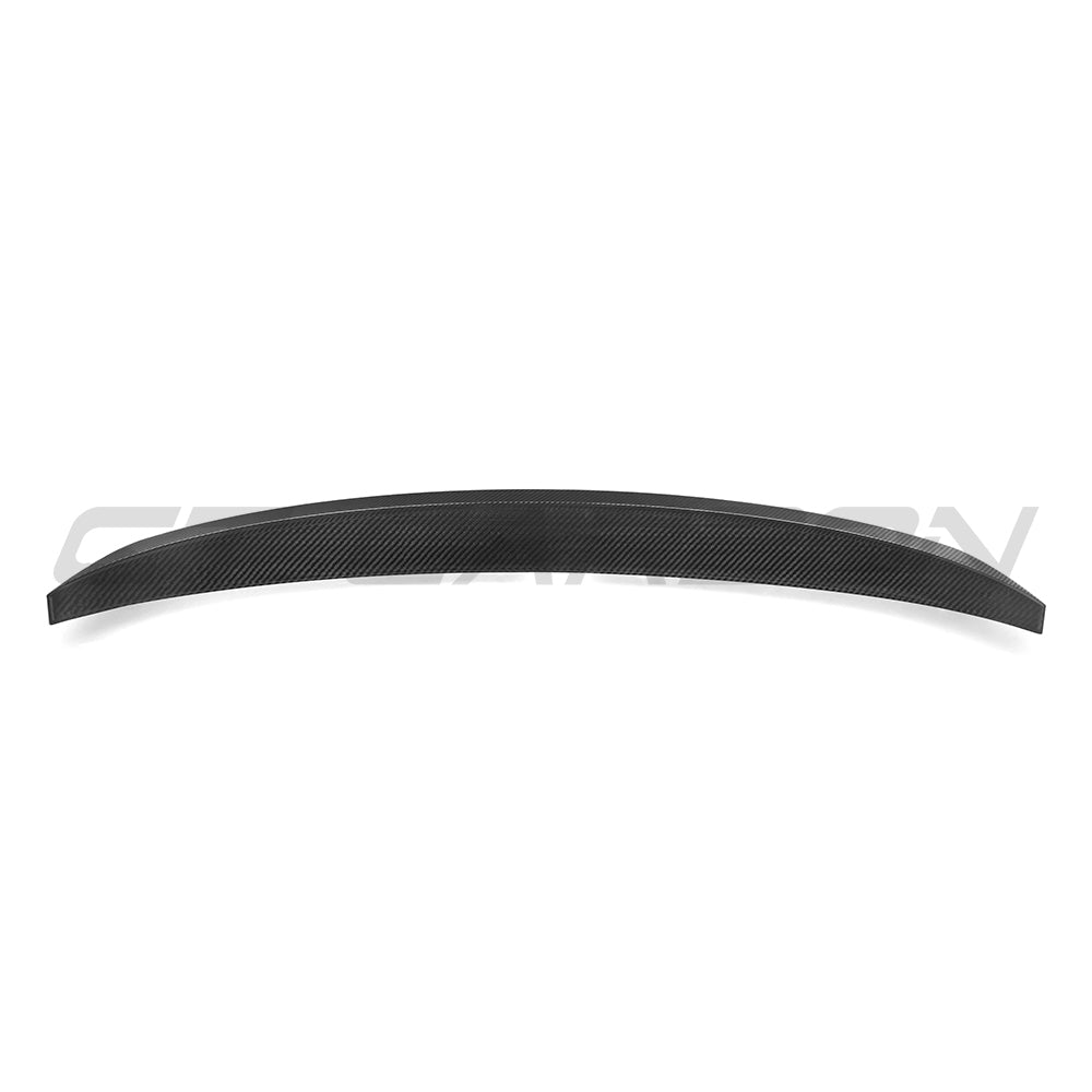 BMW G60 5 Series full carbon fibre kit by CT Carbon, including spoiler and body accents on a sleek car.