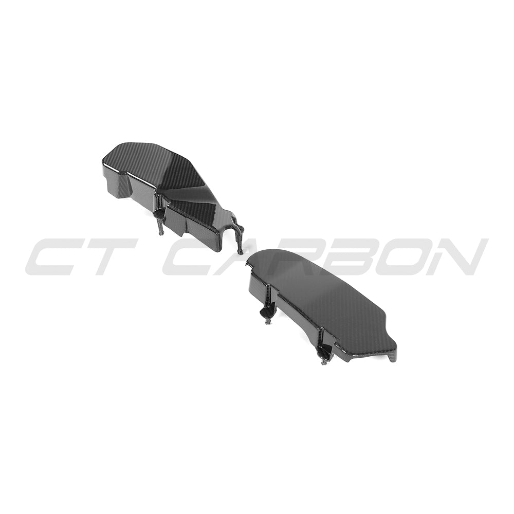 BMW G90 G99 M5 2024 carbon fibre engine bay covers by CT Carbon, showcasing sleek, lightweight accessory for sporty engine appearance.