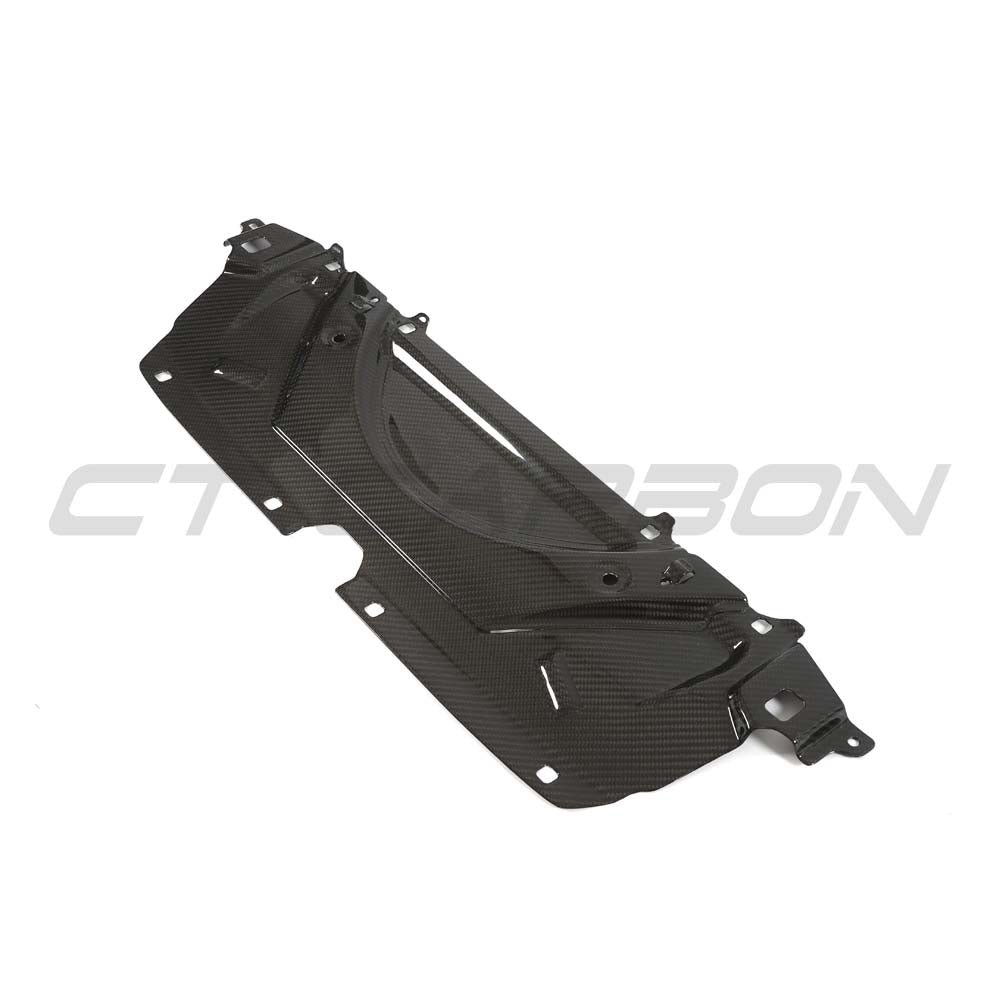 BMW G90 G99 M5 2024 carbon fibre engine bay cover kit by CT Carbon, showing sleek carbon fibre panels in a detailed view.