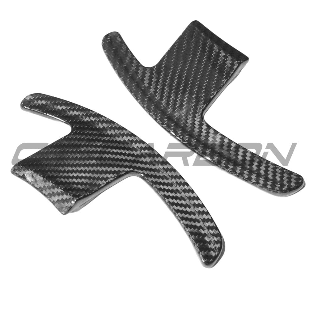 BMW GXX F40 Carbon Fibre Shifter Paddles by CT Carbon, featuring sleek black carbon fiber design and ergonomic shaping.