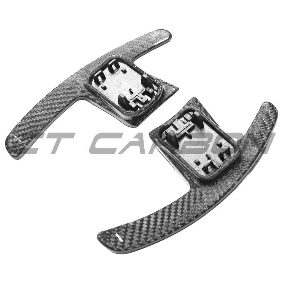 BMW GXX F40 Carbon Fibre Shifter Paddles by CT Carbon, close-up view showing sleek black carbon fiber design and mounting details.