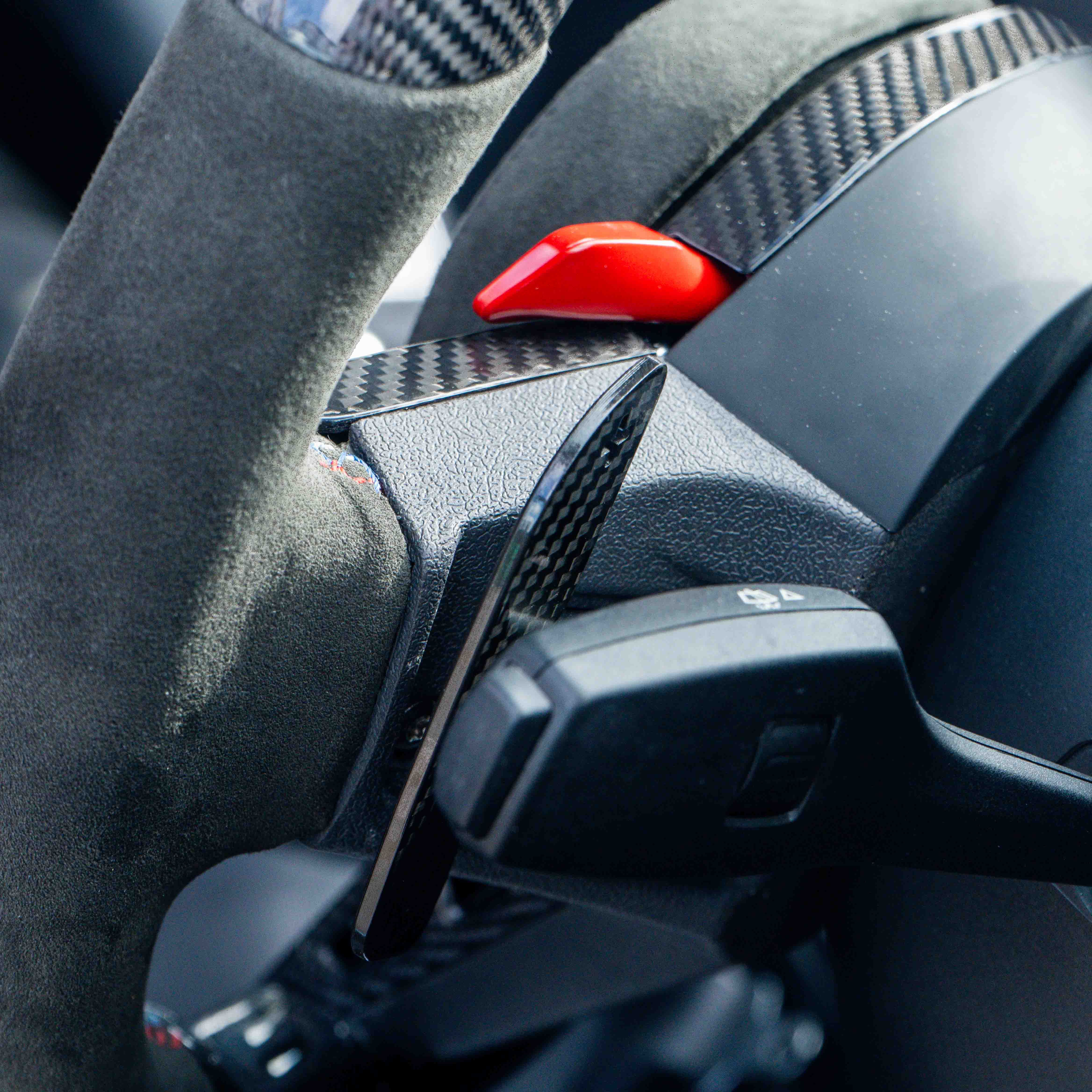 BMW Gxx carbon fibre magnetic shifter paddles by CT Carbon, lightweight racing accessories for precise gear shifting.
