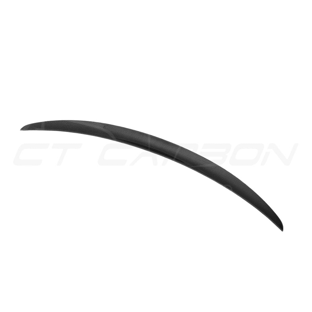BMW M2 F87 OG full carbon fiber kit by CT Carbon, featuring MP style components on a sleek car with carbon fiber accents.