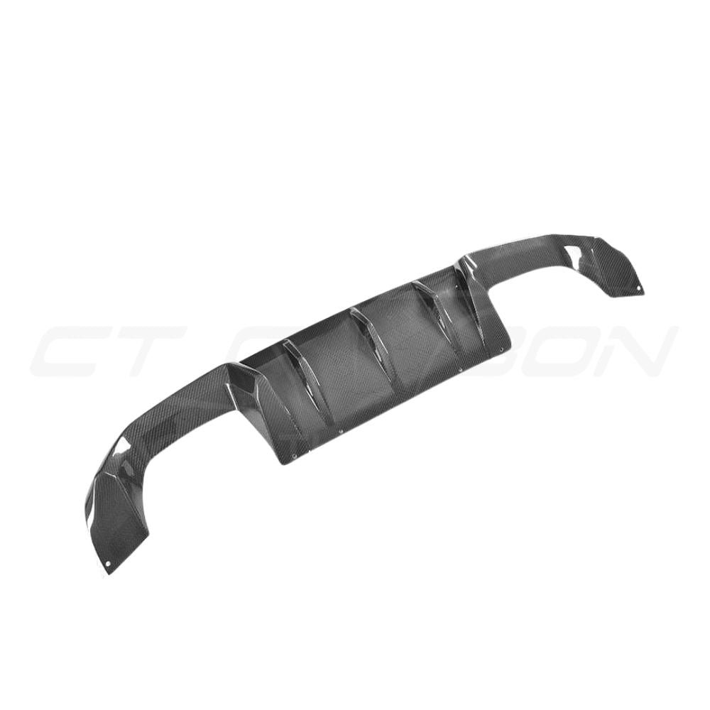 BMW M2 F87 OG full carbon fiber kit by CT Carbon, featuring MP style components on a sleek, high-performance sports car.