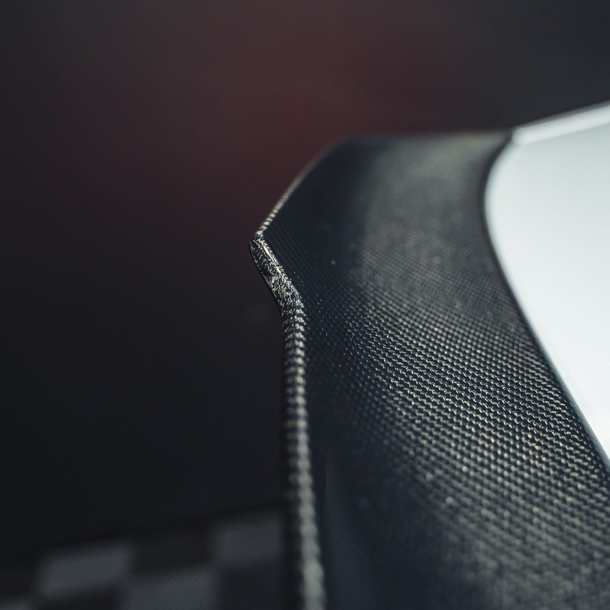 BMW M2 and M2C F87/F22 carbon fibre ducktail spoiler by CT Carbon, showing sleek aerodynamic design on a sporty car.
