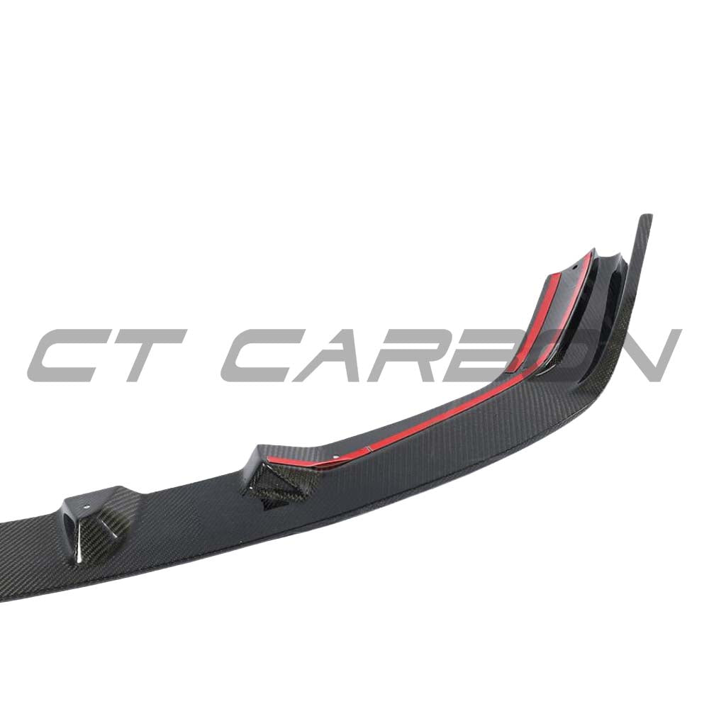 BMW M2C F87 carbon fiber splitter V2 by CT Carbon, showcasing the aerodynamic 3D-style design on the front bumper.