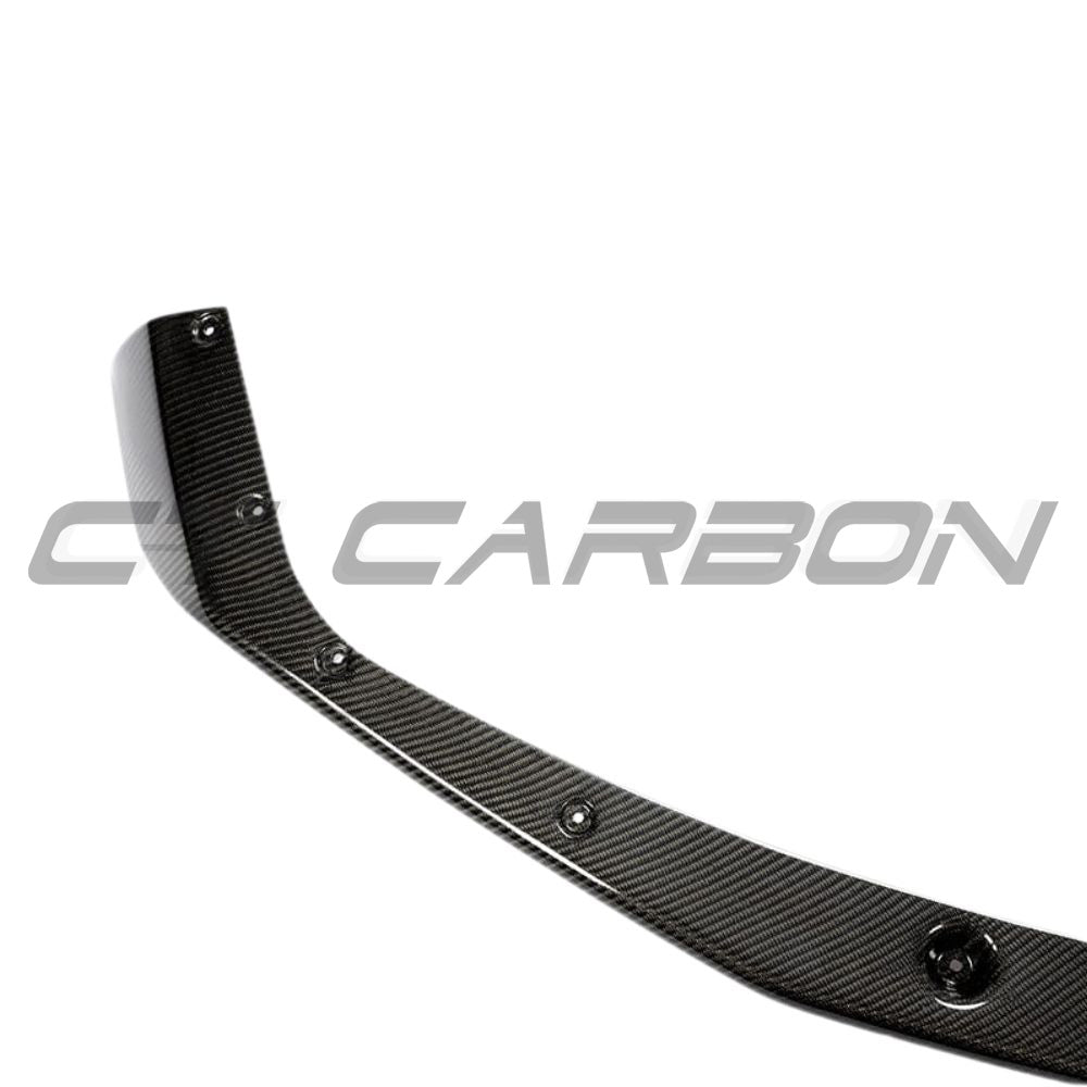 BMW M2C F87 full carbon fibre kit by CT Carbon, featuring splitter and aerodynamic components on a carbon fibre car body.