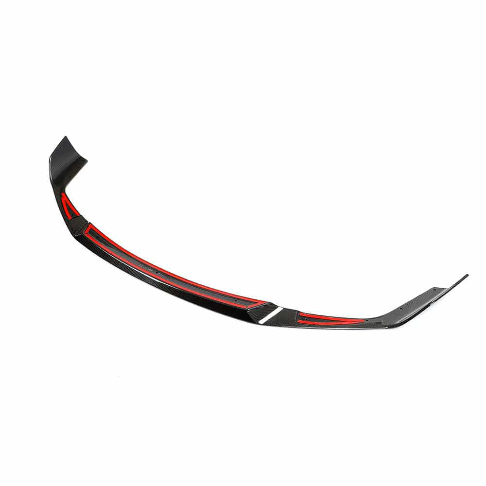 BMW M2C F87 full carbon fibre kit by CT Carbon, featuring a splitter and aerodynamic components on a sleek car.