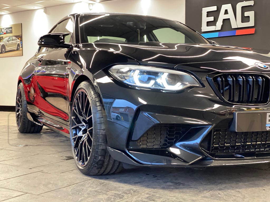 BMW M2C F87 full carbon fiber kit by CT Carbon, showcasing the sleek, lightweight carbon fiber components on the car.