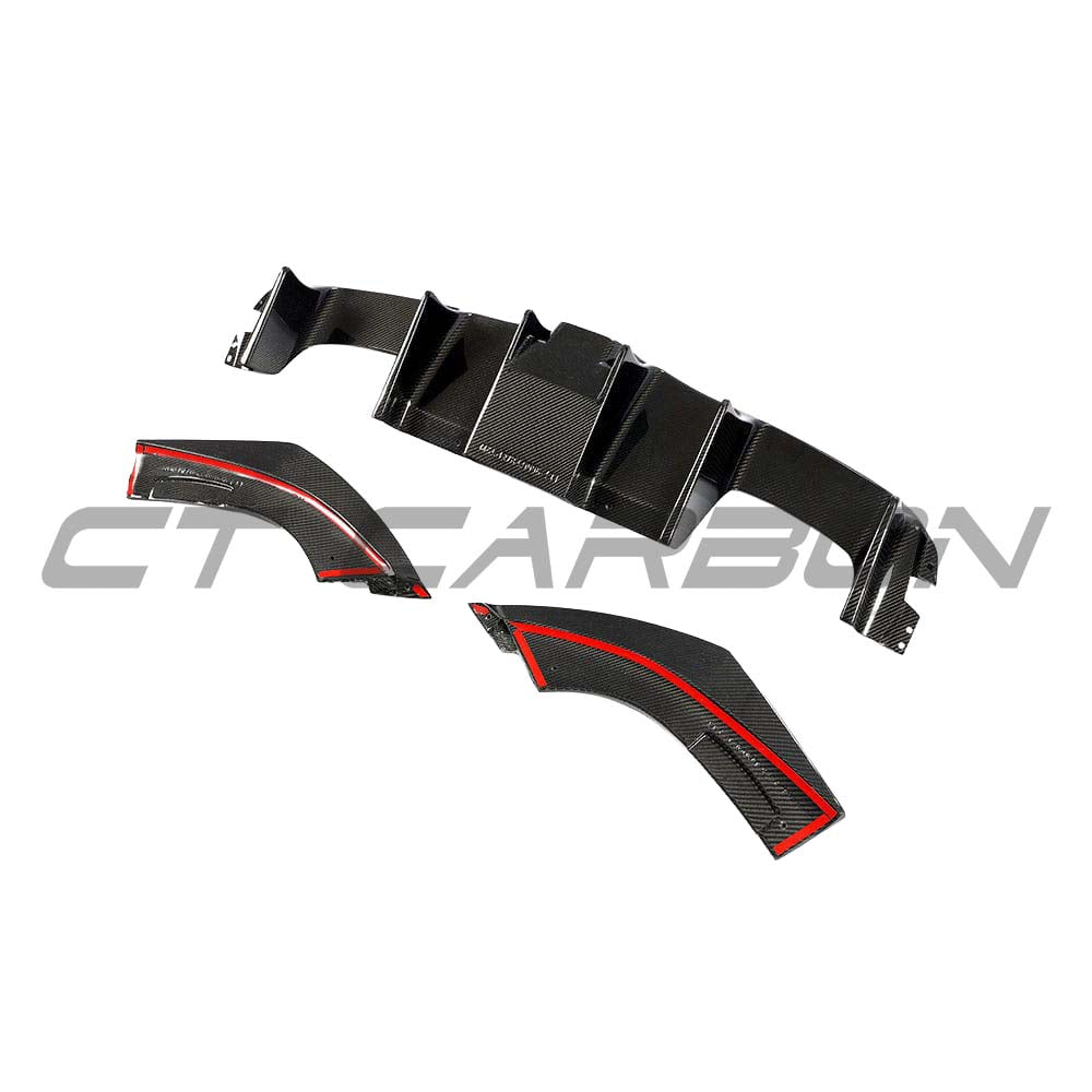 BMW F87 M2 2016-2018 CT Carbon full carbon fibre kit, aggressive carbon fibre diffuser on a sleek sports car.